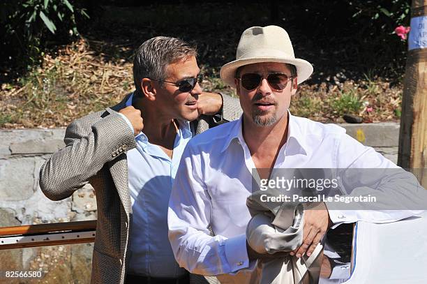 Actors Brad Pitt and George Clooney arrive for the 'Burn After Reading' Photocall part of the 65th Venice Film Festival at Palazzo del Casino on...