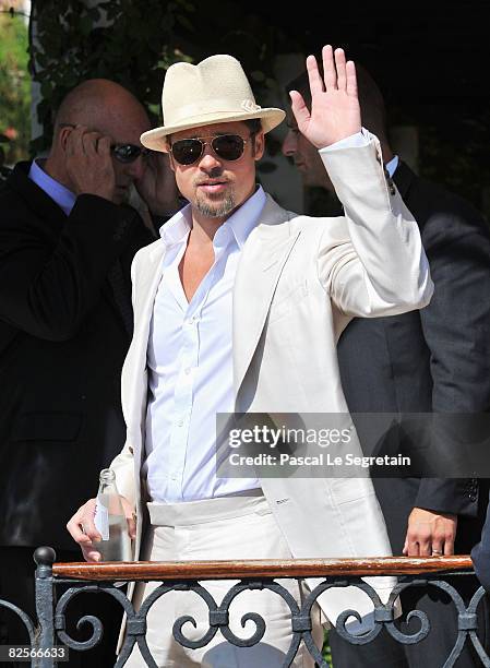 Brad Pitt waves as he arrives for the 'Burn After Reading' Photocall part of the 65th Venice Film Festival at Palazzo del Casino on August 27, 2008...