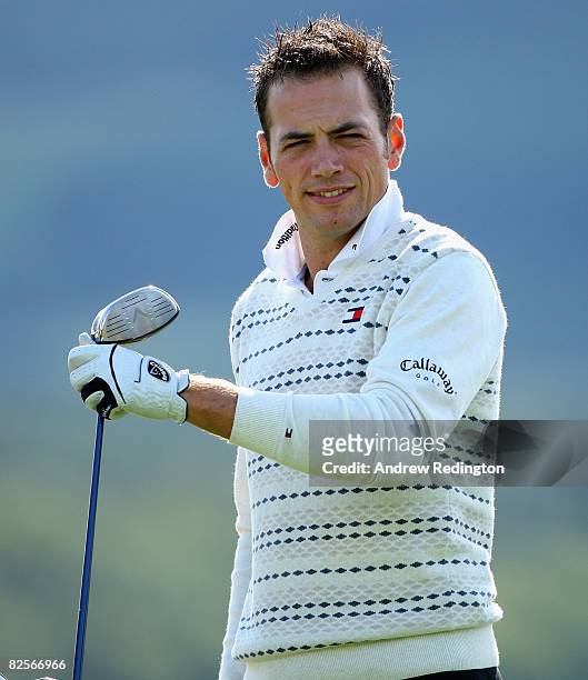 Nick Dougherty of England watches his tee-shot on the 11th hole during the Pro-Am prior to the start of The Johnnie Walker Championship at Gleneagles...