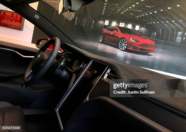View of the inside of a a brand new Tesla Model S at a Tesla showroom on August 2, 2017 in Corte Madera, California. Tesla will report second-quarter...