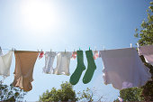 washing on line one pair of green socks