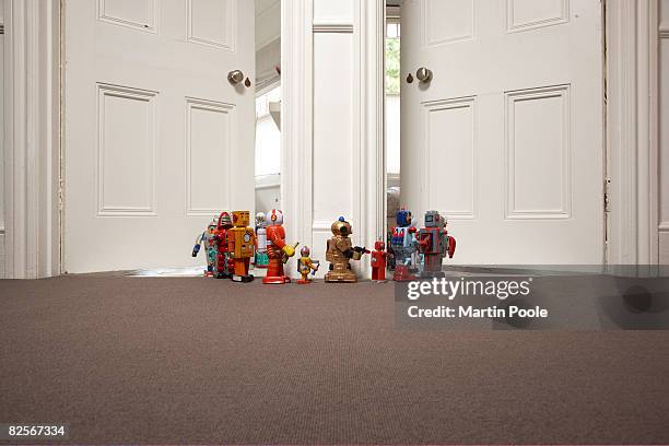 toy robots going from one room to another - breakout room stock pictures, royalty-free photos & images