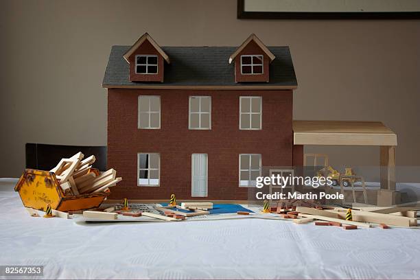 dolls house with extension in construction - model kit stock pictures, royalty-free photos & images