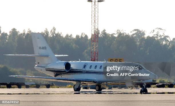 Brazilian football player Neymar's private jet is pictured upon its departure from Francisco Sa Carneiro airport on the outskirts of Porto, following...