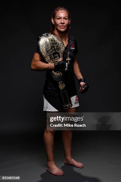 Women's lightweight champion Cris Cyborg of Brazil poses for a post fight portrait backstage during the UFC 214 event inside the Honda Center on July...