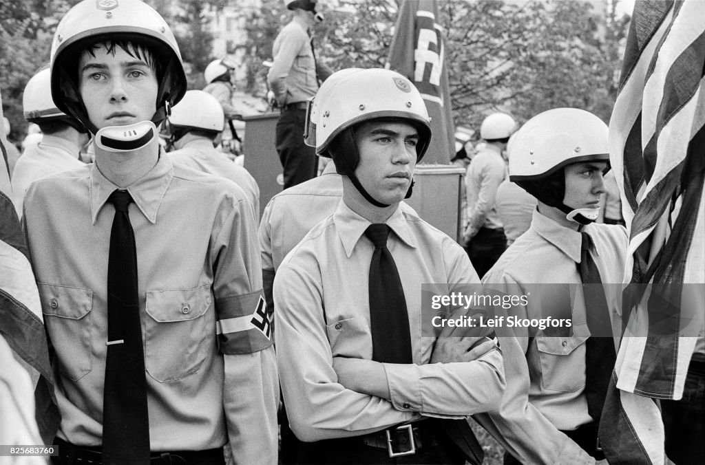 Closeup of a member of the American Nazi Party, with a swastika
