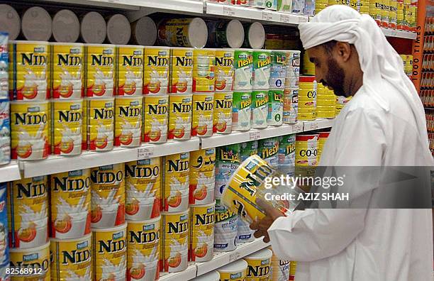 38 Cans Of Powdered Milk Stock Photos, High-Res Pictures, and Images ...
