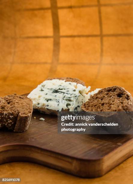 roquefort piece and cut baguette. - roquefort stock pictures, royalty-free photos & images