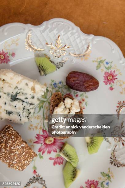 baguette, roquefort, kiwi and date. - budding yeast stock pictures, royalty-free photos & images