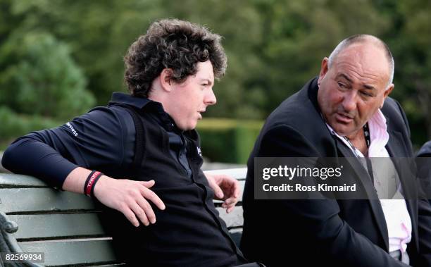 Rory McIlroy of Northern Ireland and his manager Andrew 'Chubby' Chandler talk during the pro-am event prior to The Johnnie Walker Championship at...