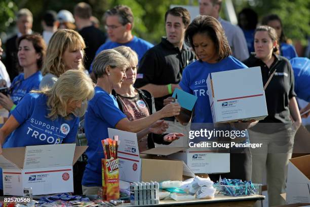 Michelle Obama , wife of presumptive Democratic presidential nominee Barack Obama,, and Jill Biden wife of Barack Obama's running mate, U.S. Sen. Joe...