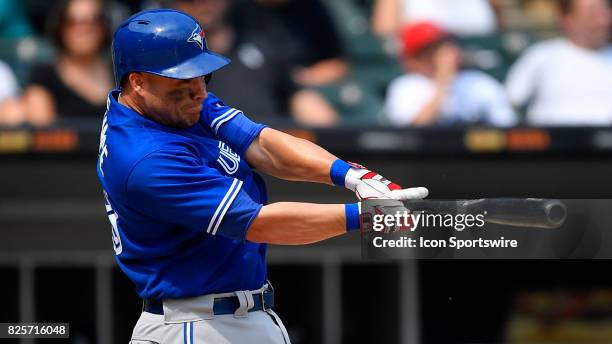 Toronto Blue Jays left fielder Steve Pearce hits the ball for a home run during the game between the Toronto Blue Jays and the Chicago White Sox on...