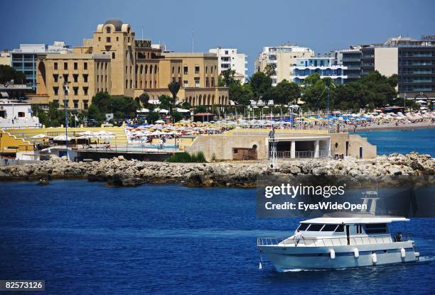 Yacht in the Mandraki Harbour is seen with the casino in background on July 20, 2008 in Rhodes, Greece. Rhodes is the largest of the Greek Dodecanes...