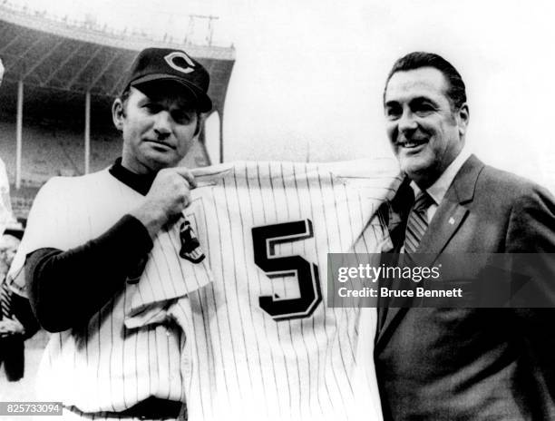 Manager Alvin Dark of the Cleveland Indians and Lou Boudreau pose for a portrait as the Indians are retiring Boudreau's jersey before an MLB game...