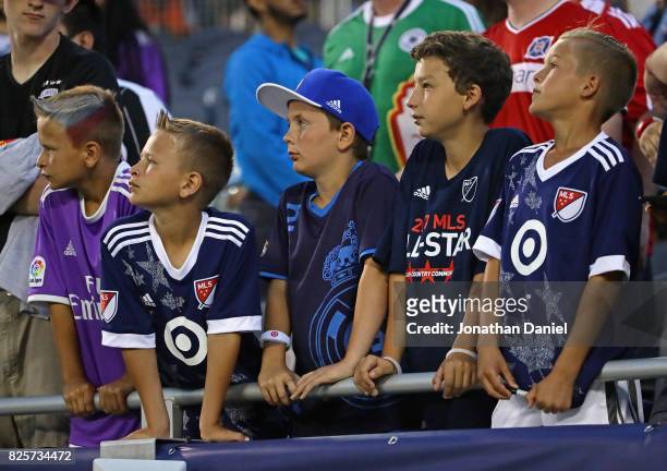 Fans watch warm-ups before the MLS All-Stars take on Real Madrid in the 2017 MLS All- Star Game at Soldier Field on August 2, 2017 in Chicago,...