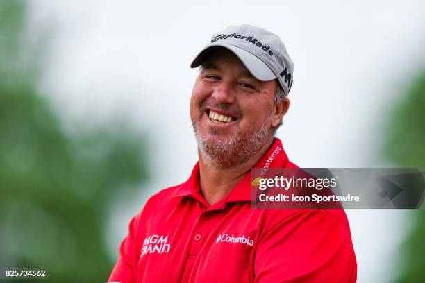 Boo Weekley smiles towards the camera after teeing off on the 1st hole during second round action of the RBC Canadian Open on July 28 at Glen Abbey...