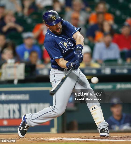Trevor Plouffe of the Tampa Bay Rays singles in the first inning against the Houston Astros at Minute Maid Park on August 2, 2017 in Houston, Texas.