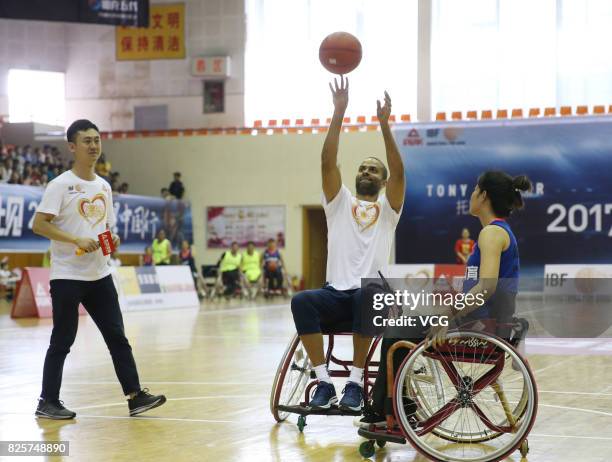 Player Tony Parker plays basketball with disabled basketball players at Guangxi Sports Center on August 2, 2017 in Guilin, Guangxi Zhuang Autonomous...