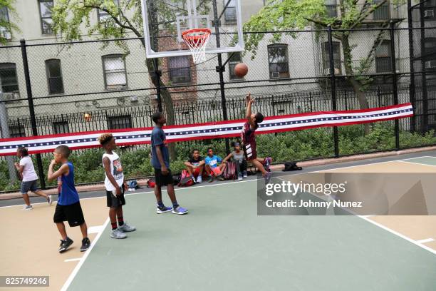 View of the atmosphere at the ribbon cutting ceremony at Crispus Attucks Playground on August 2, 2017 in the Brooklyn borough of New York City. NYC...