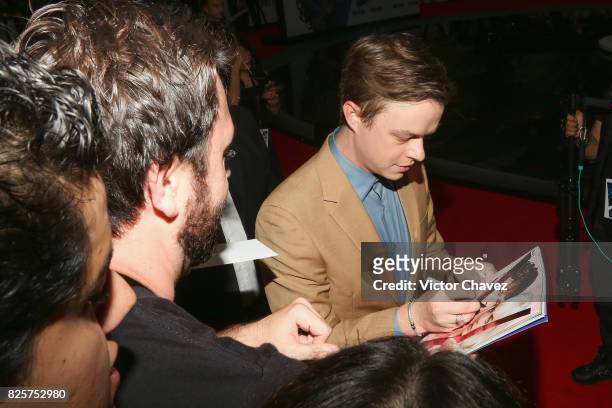 Actor Dane DeHaan signs autographs and takes selfies with fans during the "Valerian And The City Of A Thousand Planets" Mexico City premiere at...