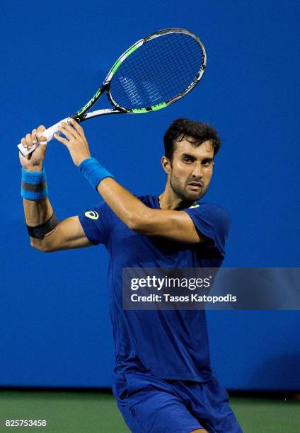 Yuki Bhambri of India competes with Gael Monfiles of France at William H.G. FitzGerald Tennis Center on August 2, 2017 in Washington, DC.