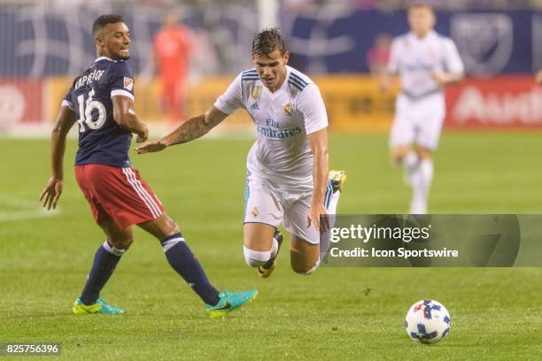 All-Star and Chicago Fire Defender Johan Kappelhof fouls Real Madrid defender Theo Hernandez in the first half during a soccer match between the MLS...