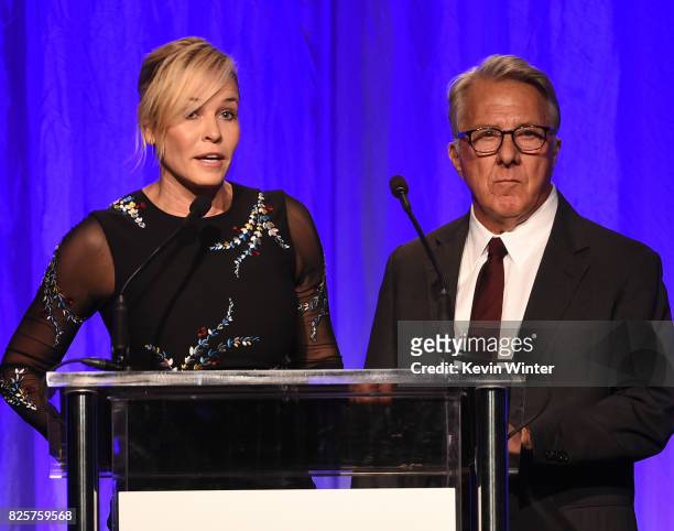 Host Chelsea Handler and Dustin Hoffman speak onstage at the Hollywood Foreign Press Association's Grants Banquet at the Beverly Wilshire Four...