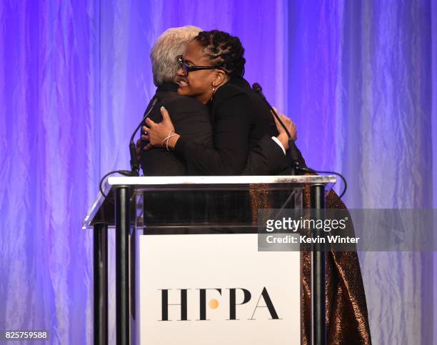Dustin Hoffman and Ava DuVernay speak onstage at the Hollywood Foreign Press Association's Grants Banquet at the Beverly Wilshire Four Seasons Hotel...