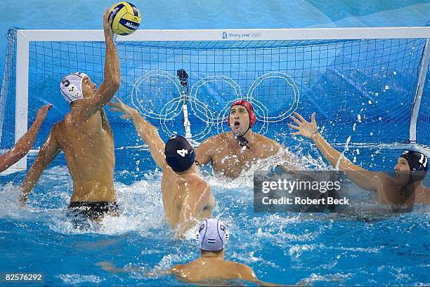 Summer Olympics: Hungary Tamas Kasas in action, scoring goal vs USA Merrill Moses during Men's Gold Medal Match at Yingdong Natatorium. Hungary won...