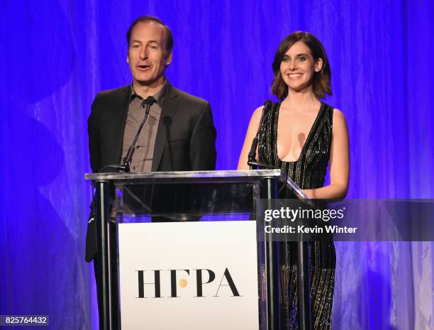 Bob Odenkirk and Alison Brie speak onstage at the Hollywood Foreign Press Association's Grants Banquet at the Beverly Wilshire Four Seasons Hotel on...