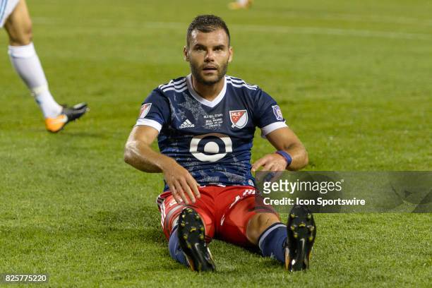 All-Star and Chicago Fire Forward Nemanja Nikolic sits on the ground after missing a shot on goal in the second half during a soccer match between...
