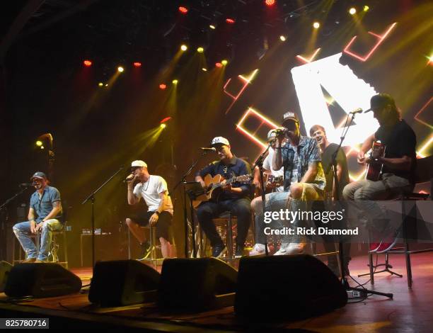 Singer/Songwriters Jason Aldean, Tyler Hubbard, Deric Ruttan, Brett Warren, Brian Kelley, Jimmy Robbins and Brad Warren performs during Jason...