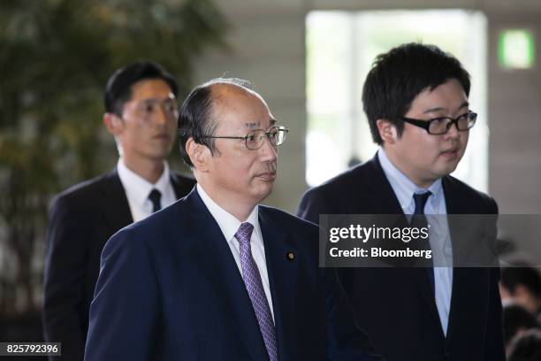 Masaharu Nakagawa, newly-appointed environment minster of Japan, center, arrives at the Prime Minister's official residence in Tokyo, Japan, on...