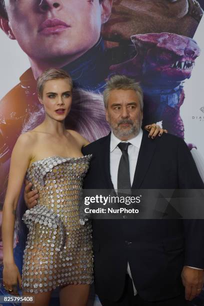 Director Luc Besson and actress Cara Delevingne are seen poses during the red carpet of Valerian and the City of a Thousand Planets Mexico City film...