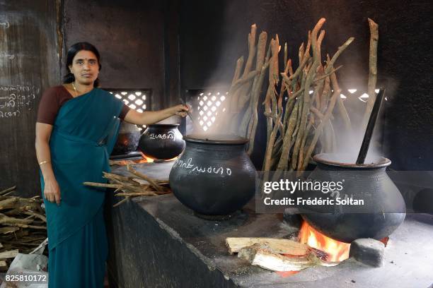 Ayurvedic retreat in Kerala. Preparation of the massage oils with different plants and roots, during the monsoon season, at the Keraleeya Ayurveda...