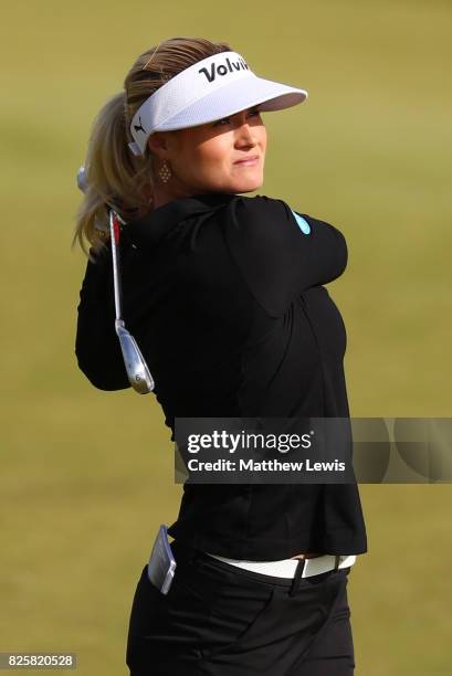 Carly Booth of Scotland hits her second shot on the 3rd hole during the first round of the Ricoh Women's British Open at Kingsbarns Golf Links on...