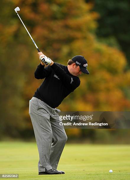 Graeme McDowell of Northern Ireland Ireland hits his second shot on the 15th hole during the first round of The Johnnie Walker Championship at...