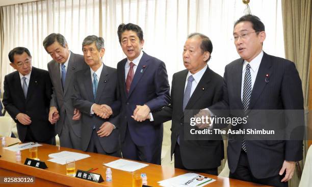 Ruling Liberal Democratic Party executives, Election Strategy Committee Chairman Ryu Shionoya, General Council Chariman Wataru Takeshita, Vice...