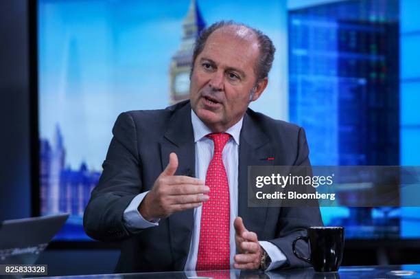 Philippe Donnet, chief executive officer of Assicurazioni Generali SpA, gestures while speaking during a Bloomberg Television interview in London,...