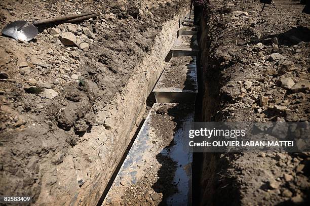 Picture shows a general view of the mass graves in which lay down the coffins of unkown Georgians soldiers killed in fighting over South Ossetia two...