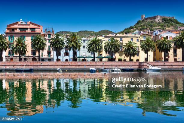 view over the colourful town of bosa and its medieval castle along the temo river - oristano stock pictures, royalty-free photos & images