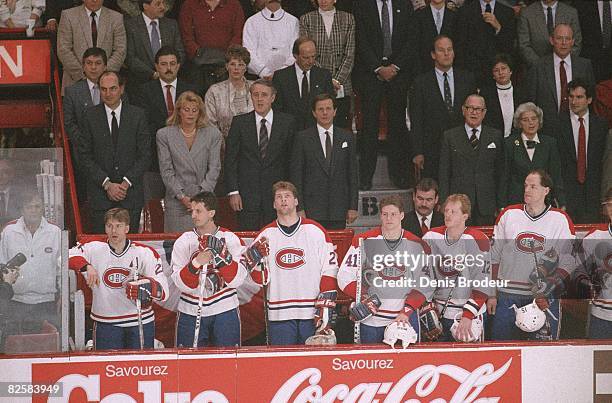 Crowd and players stand for the national anthem at the Montreal Forum during the late 1980s. Prime minister Brian Mulroney is third from the left in...