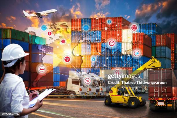 smart technology concept with global logistics partnership and transportation of container cargo ship and cargo plane - cargo plane stock-fotos und bilder