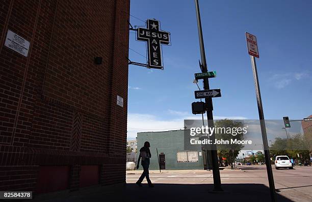 Man walks past the Denver Rescue Mission homeless shelter August 27, 2008 in Denver, Colorado. Some 1,400 delegates to the Democratic National...