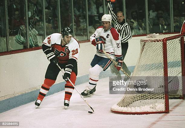 Flyers captain Dave Poulin and Canadiens counterpart Bob Gainey behind the net at the Montreal Forum during the Wales Conference finals in 1987.