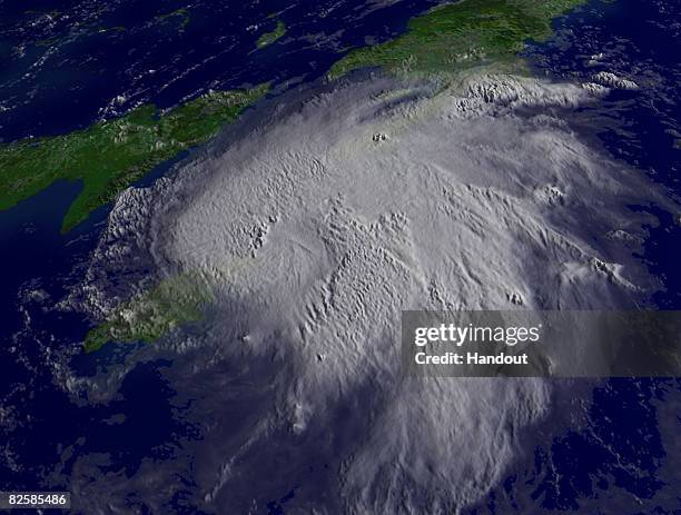 In this satellite image provided by the National Oceanic and Atmospheric Administration , Tropical Storm Gustav churns through the Caribbean at 13:45...