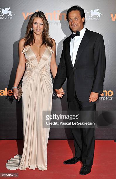 Actress / model Elizabeth Hurley and husband Arun Nayar attend the premiere of the movie "Valentino: The Last Emperor" held at Teatro La Fenice...