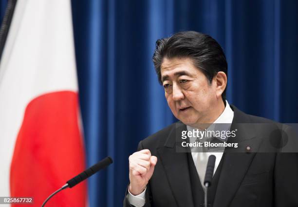 Shinzo Abe, Japan's prime minister, gestures while speaking during a news conference in Tokyo, Japan, on Thursday, Aug. 3, 2017. Abe reshuffled his...