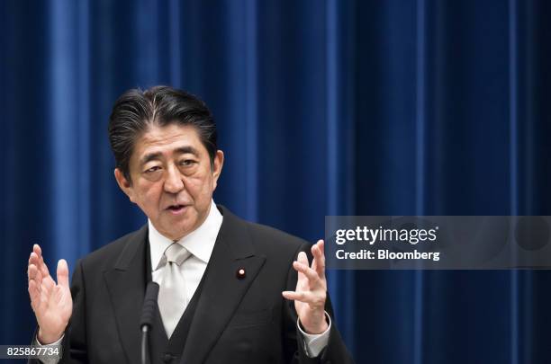 Shinzo Abe, Japan's prime minister, gestures while speaking during a news conference in Tokyo, Japan, on Thursday, Aug. 3, 2017. Abe reshuffled his...