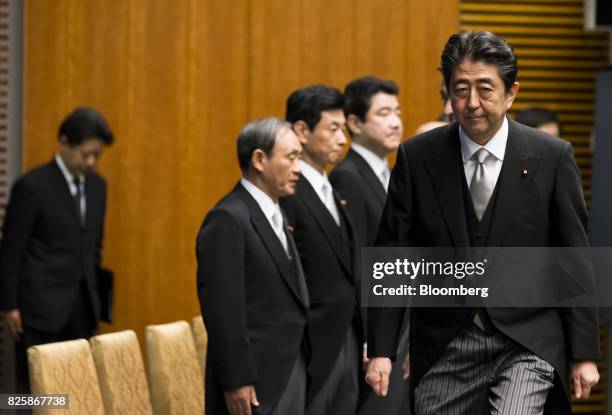 Shinzo Abe, Japan's prime minister, arrives ahead of a news conference in Tokyo, Japan, on Thursday, Aug. 3, 2017. Abe reshuffled his ministers and...